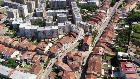 Aerial-view-of-Igreja-de-São-Vicente-amidst-the-urban-landscape-of-Braga,-Portugal