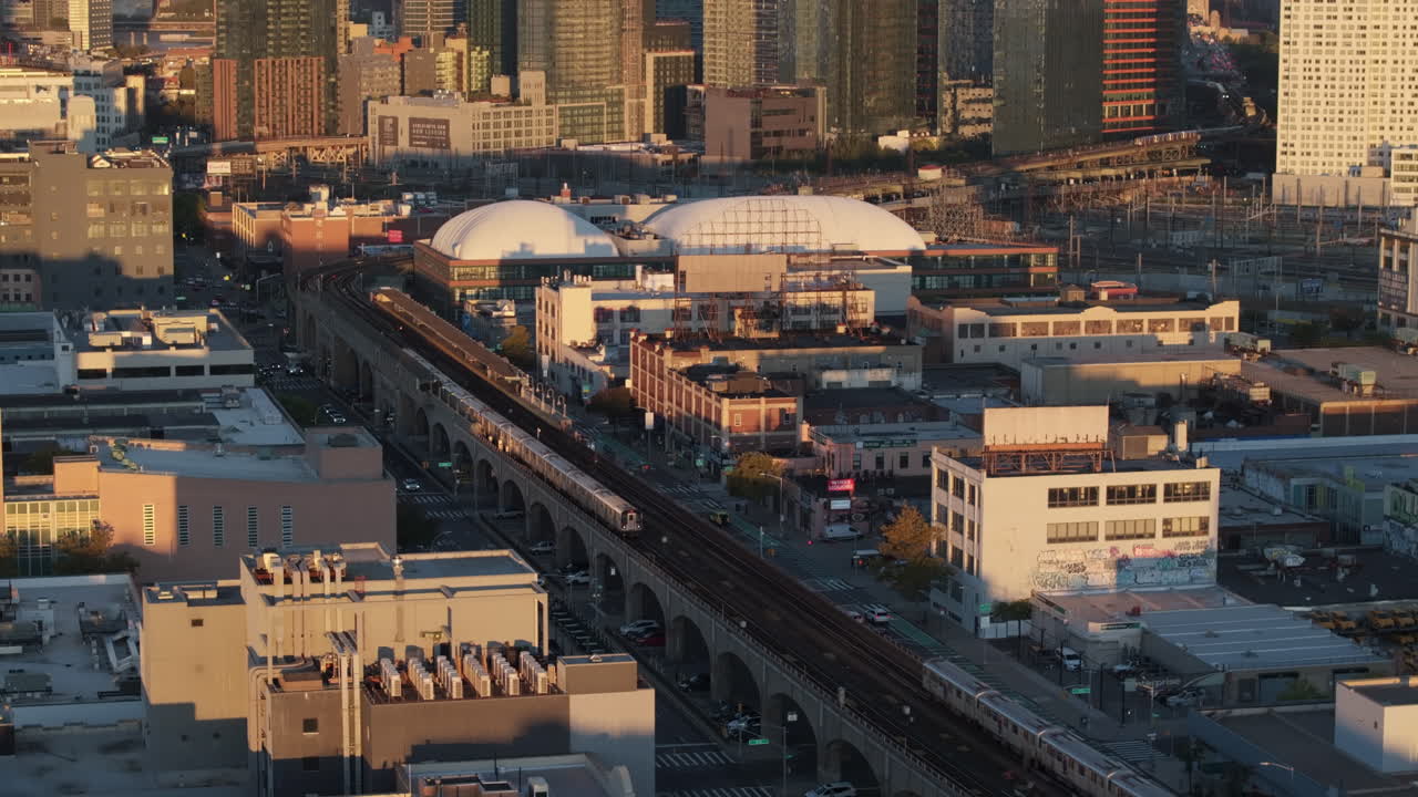 Establishing shot of a New York City subway train in Queens. Shot on an Autumn morning in 4k.