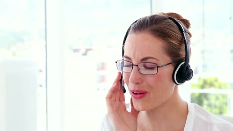 Call-centre-agent-working-at-her-desk