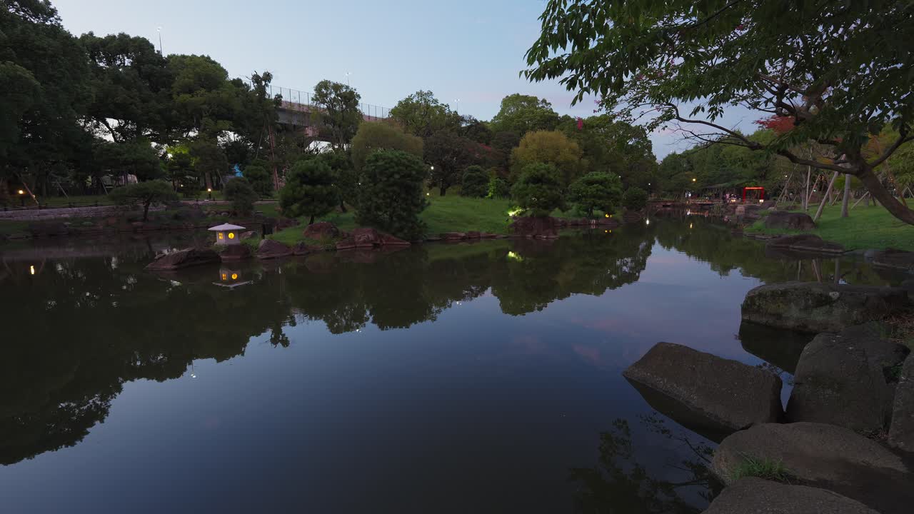Scenic park landscape with lake and trees