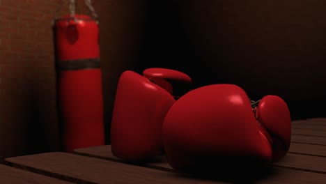 guantes de boxeo rojos en una mesa de madera