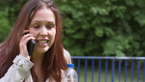 Stressed-Or-Angry-Woman-Outdoors-With-Financial-Worries-About-Cost-Of-Living-Crisis-Debt-And-Paying-Bills-Talking-On-Mobile-Phone-12