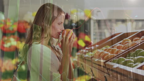 animation of financial data processing over caucasian woman shopping in grocery store