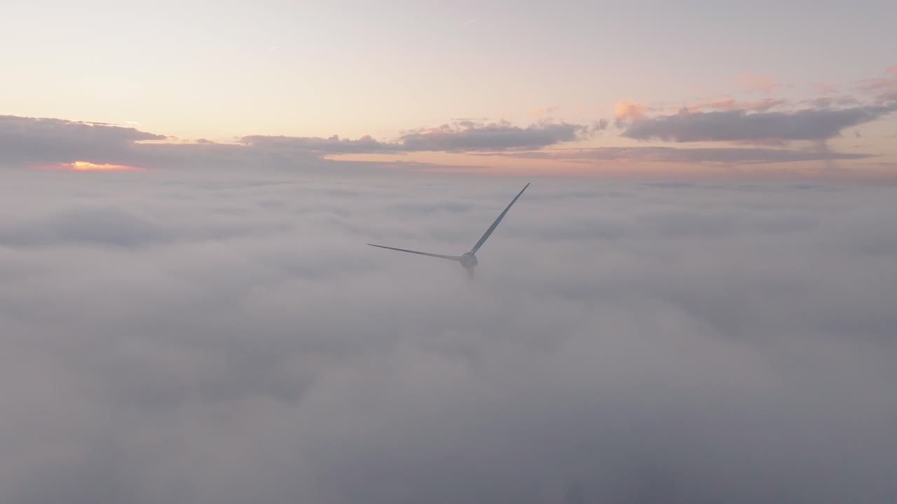 Drone shot of a Windturbine in cloudy conditions