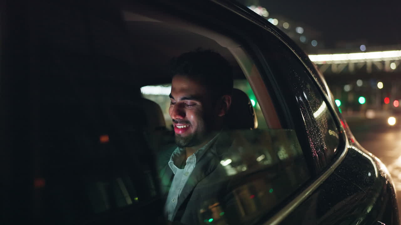 Man in car at night