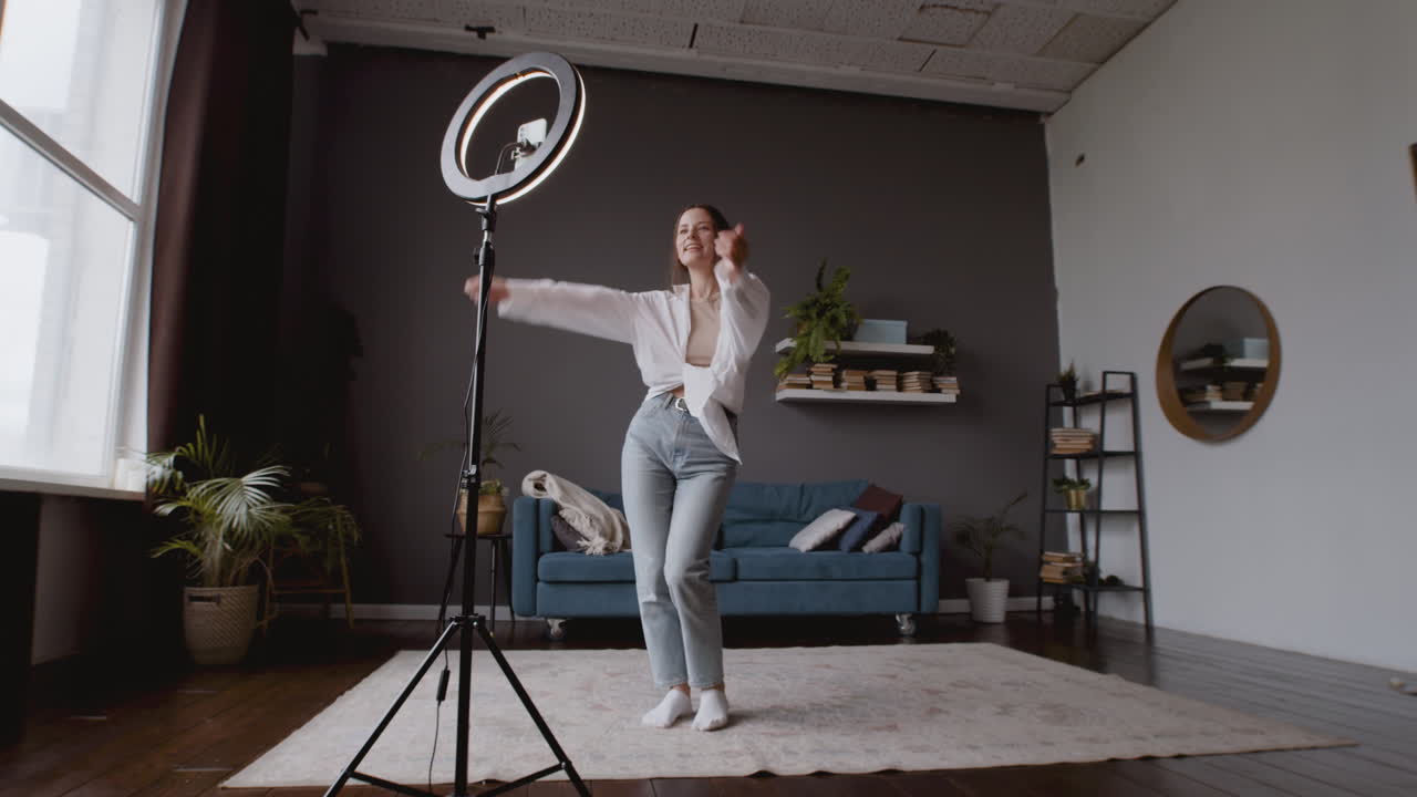 Wide Shot Of A Influencer Woman Shooting Her Dance Steps To Upload It To Tiktok