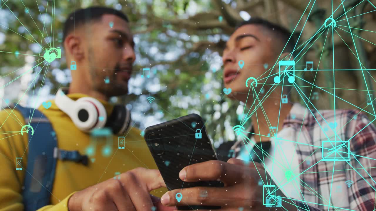 Animation of connections and data processing over biracial man using smartphone