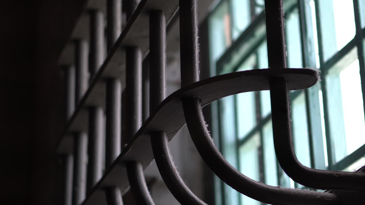 Alcatraz Prison Details, Strong Metal Bards on Window in Cellhouse, California USA