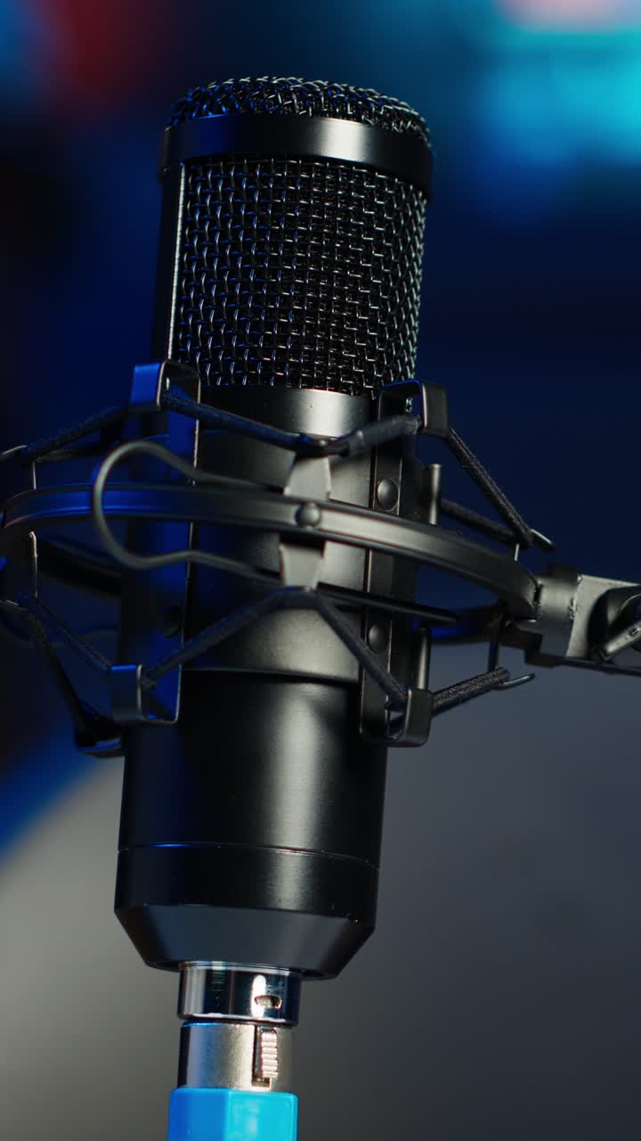 Vertical video Close up shot of podcast microphone used to record internet show