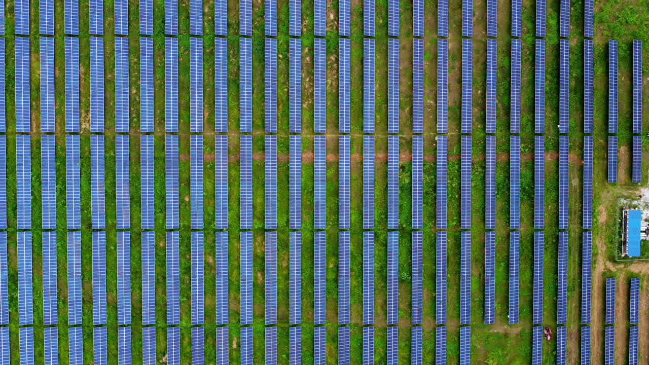 Rows Of Modern Photovoltaic Solar Panels In An Ecological Solar Power Farm