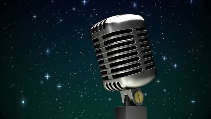 Animazione di stelle che cadono su un microfono su sfondo scuro.