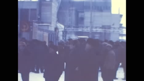 a candid view of people walking down a soviet factory. circa ussr 1970: a candid view of people walking down a soviet factory