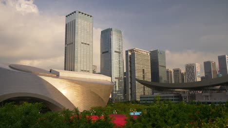 puesta de sol soleada ciudad de shenzen centro de la ciudad cámara lenta panorama 4k china