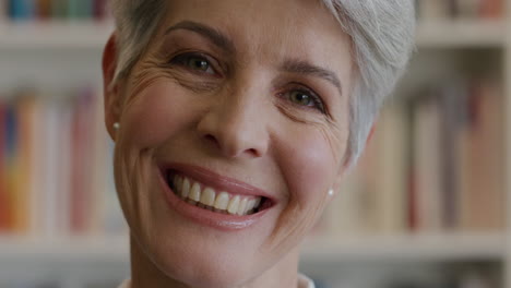 smiling-mature-student-portrait-university-lecturer-in-library-education