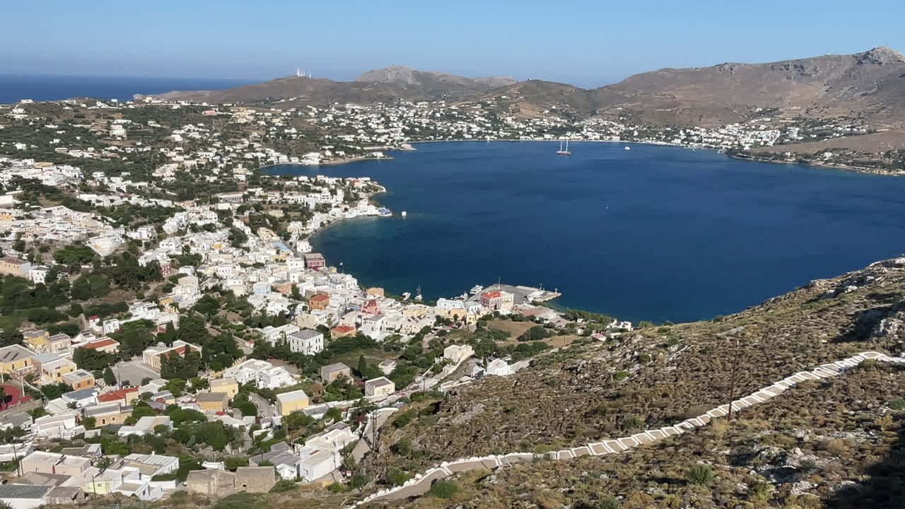 Greece,Leros Island, Footage from the castle, over view of the Agia Marina Village and bay, traditional white houses and the deep blue sea lying under the castle.