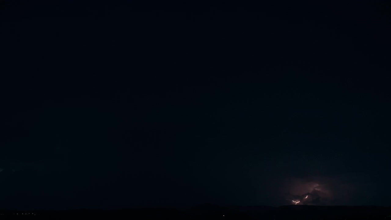 Massive Thunderstorm Approaching Over Dark Horizon