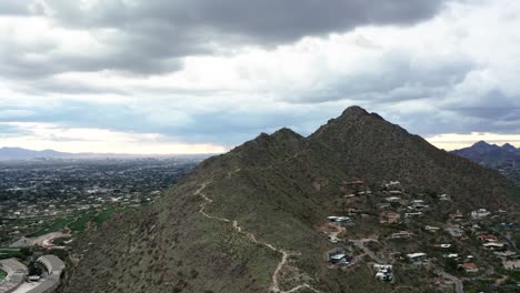 drone shot of mansions built into the side of camelback mountain