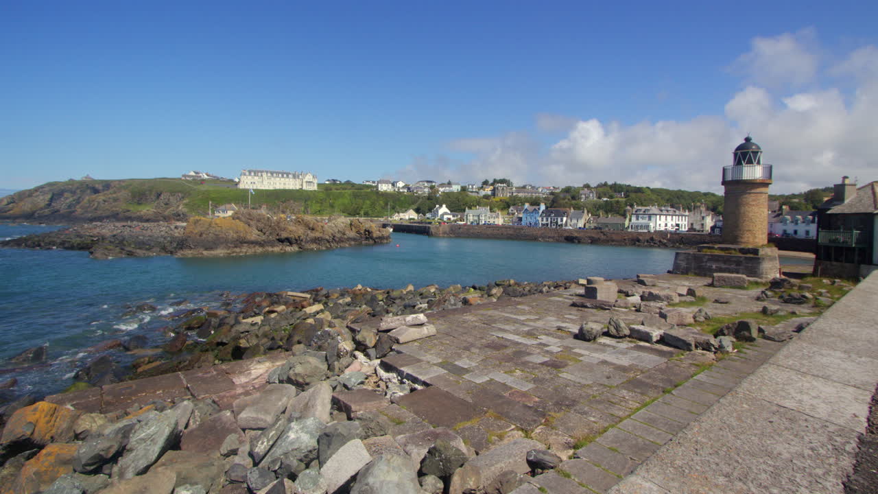 looking across portPatrick harbour port Patrick and lighthouse in background
