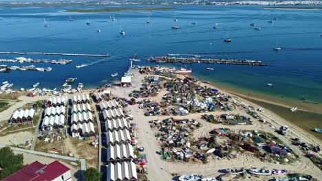 Culatra-Island,-Faro,-Portugal,-village-buildings,-vessel,-boat-coastline