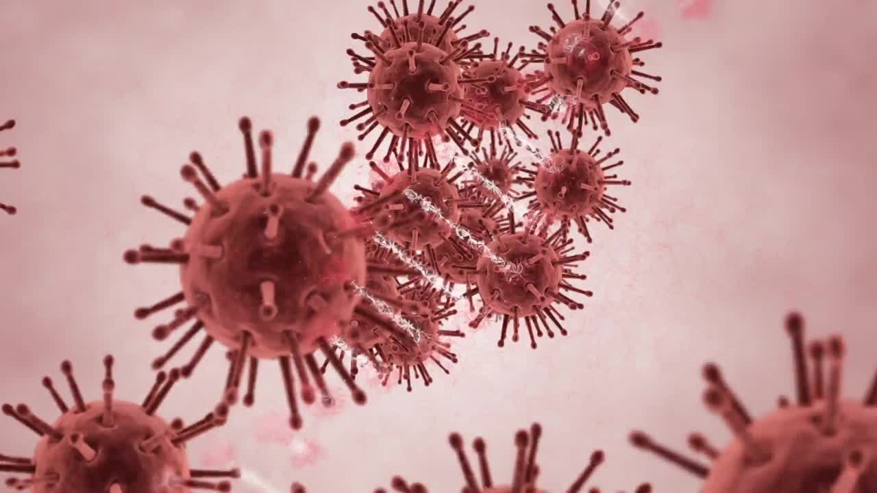 animación de la cadena de adn girando sobre las células de covid 19 flotando