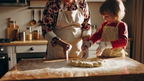 grandmother and grandchild baking together