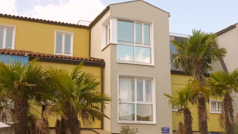 colorful nordic-style buildings in the sunny "le gabut" district of la rochelle, france