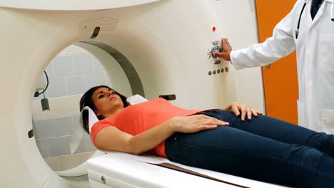 a patient is loaded into an mri machine