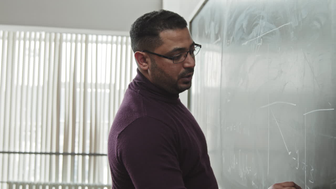 Male Mixed-Race Professor of Maths at Blackboard