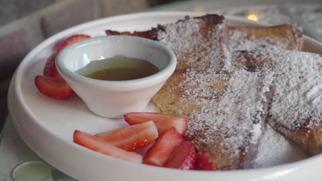 french toast with strawberries and honey