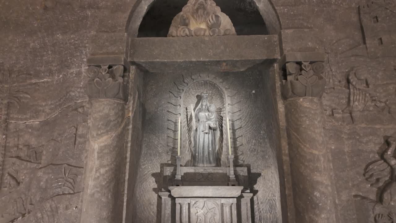 Carved salt statue of the Virgin Mary and Child at the Wieliczka Salt Mines, Krakow, Poland