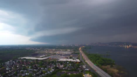 dramatic shelf cloud over cityscape
