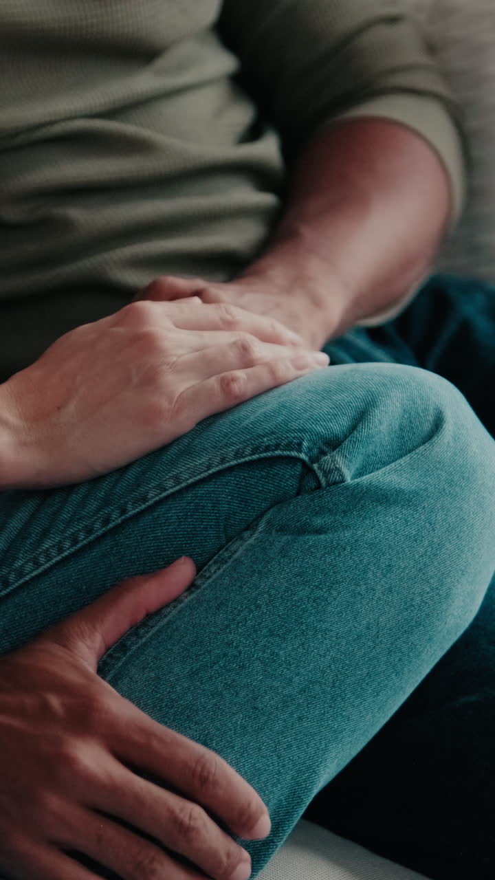 Couple Holding Hands at Home