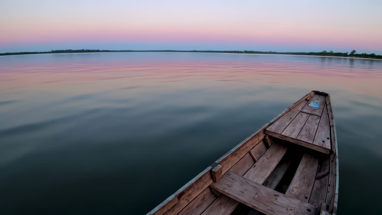 Wooden Boat on Calm Lake at Sunrise/Sunset