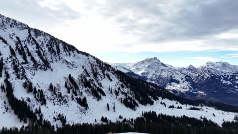 magnificient landscape of arvenbüel covered in snow in amden, switzerland