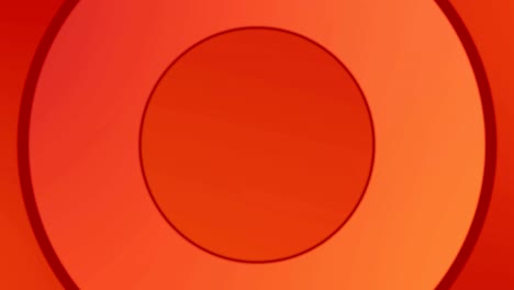 Circles forming in hypnotic motion against orange background