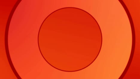 circles forming in hypnotic motion against orange background