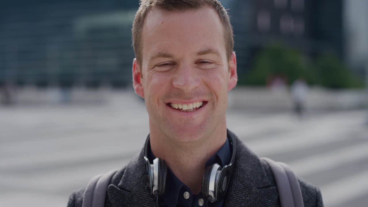 portrait successful young business man laughing enjoying professional urban lifestyle in city