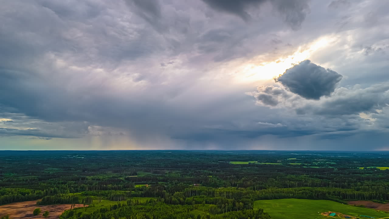 Vast landscape under dramatic sky, time lapse of moving clouds