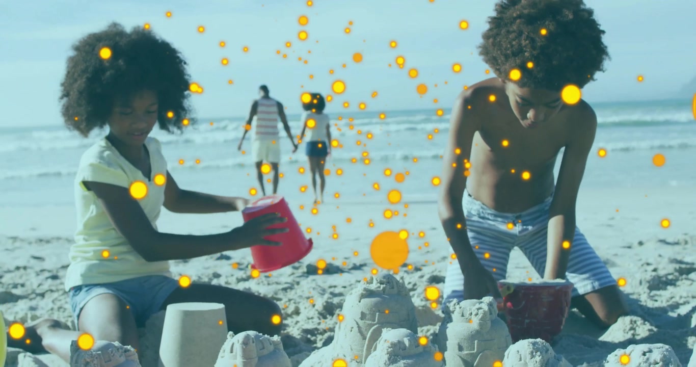 Children Playing with Sandcastles on a Sunny Beach