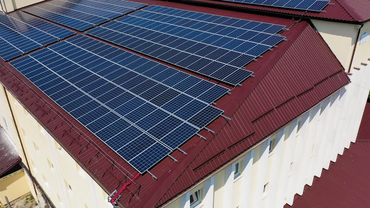 Aerial view. Top view on blue solar pannels. Green energy. Pannels on the roof.