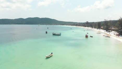 aerial landscape of tropical bay with boats at sea