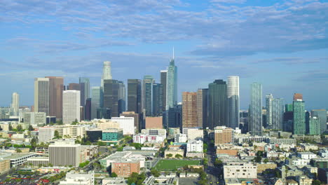 Aerial-trucking-pan-establish-across-downtown-los-angeles-skyline-financial-buildings