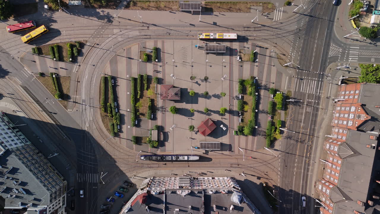 Aerial View of City Square with Tram and Bus Lines
