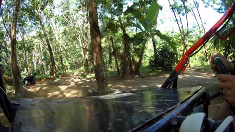 driving a buggy atv in view in thailand jungle