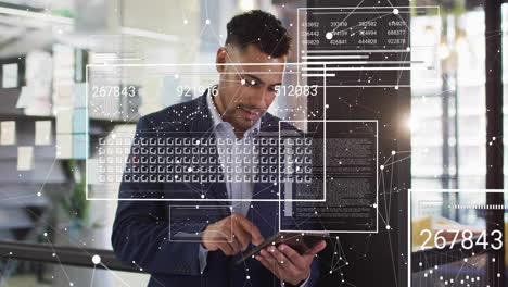 animation of digital data processing over biracial businessman using tablet in office