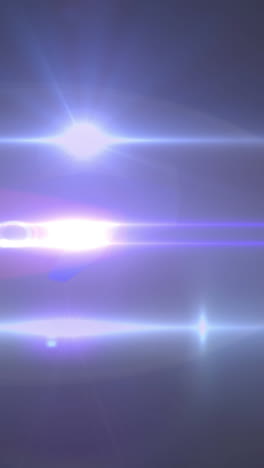 animación de haces de luz que se mueven sobre un fondo oscuro
