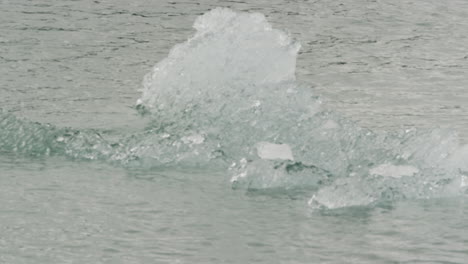 small melting icebergs litter the lagoon of jokulsarlon iceland