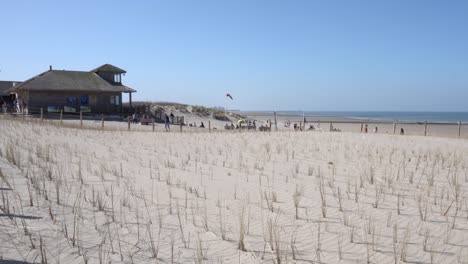 Beach-house-with-newly-planted-sand-dunes-at-the-North-sea-in-Belgium---wide-angle