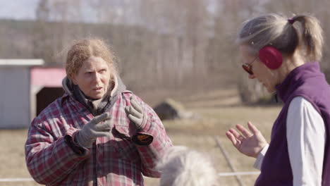 participant does debrief with facilitator at equine-assisted therapy