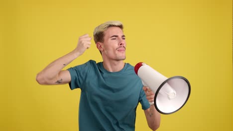 man shouting into a megaphone